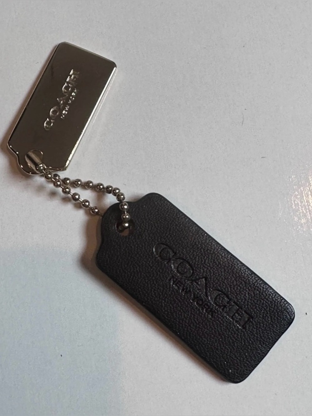 COACH Logo New York Black
Leather Hang Tag Charm Key Chain
2.25"x1" Replacement